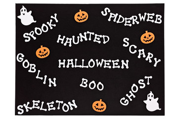 Foam Halloween words on a black mat