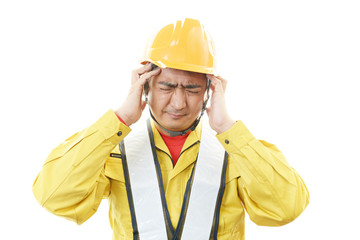 頭痛を訴える作業員