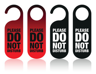 a set of please do not disturb signs