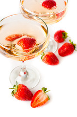 hampagne with strawberries on a white background