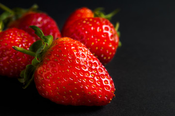 Five red strawberries