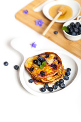 Blueberry pancakes with fresh blueberries