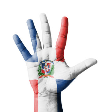 Open hand raised, multi purpose concept, Dominican flag painted