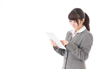 Fototapeta premium asian businesswoman using tablet computer 