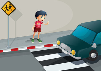 A boy stopping the car