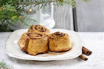 Cinnamon rolls on christmas eve table