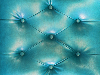 Closeup texture of vintage blue leather sofa for background