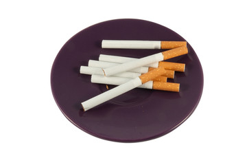 Several cigarettes on the plate