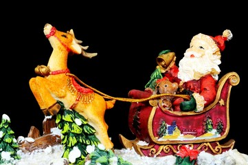 Santa in his sleigh ornament © Arena Photo UK