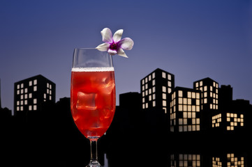 Metropolis Singapore Sling cocktail in city skyline setting