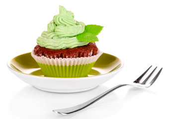 Delicious beautiful cupcake isolated on white