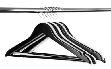 Black and white clothes hangers isolated on white