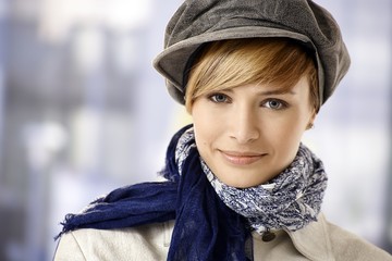 Attractive young woman in cap