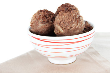 Tasty ice cream scoops in bowl, isolated on white