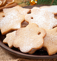 Homemade Christmas cookies sprinkled with powdered sugar
