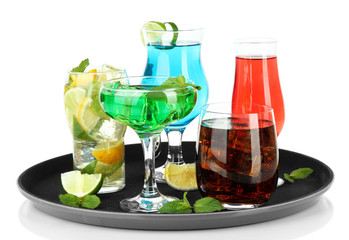 Many glasses of cocktails on tray, isolated on white