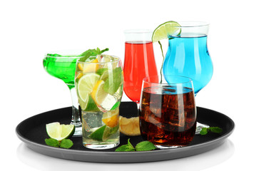 Many glasses of cocktails on tray, isolated on white