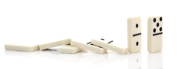 Domino effect - Row of white dominoes on white background