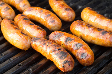 Italian sausages on grill