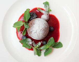 Chocolate fondant with berry sauce
