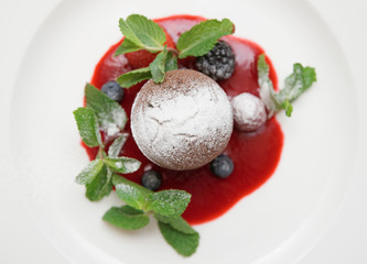 Chocolate fondant with sweet berry sauce