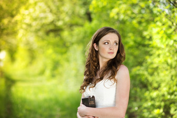 Beautiful woman with book