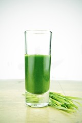 Shot glass of fresh wheatgrass