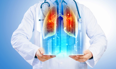 Doctor holding tablet pc