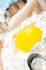 products for baking - flour and egg, close-up