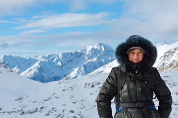 Woman on winter mountain background (Austria).