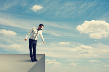 man standing over the precipice