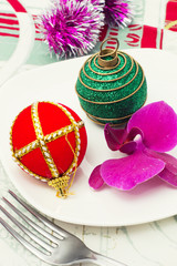 Christmas decorations and Orchid on table