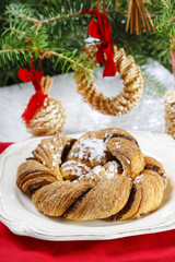 Festive braided bread on wooden table