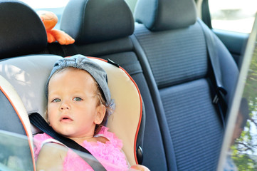 baby girl  in car