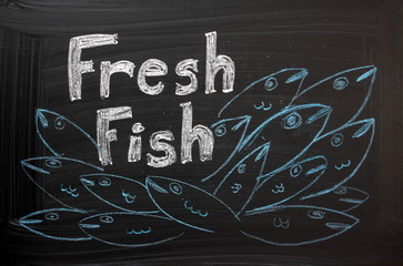 Fresh Fish advertised on a Blackboard Sign