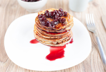 Delicious pancakes with cherry jam