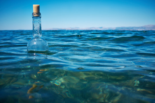 Bottle with a message in water