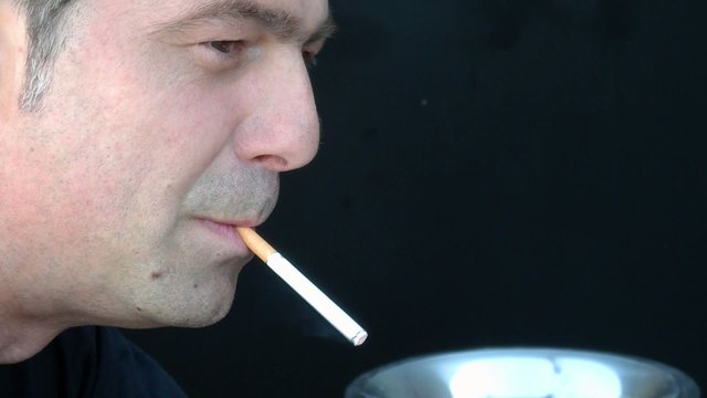 Lighting a cigarette