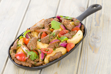Lomo Saltado - Traditional Peruvian beef stir-fry.