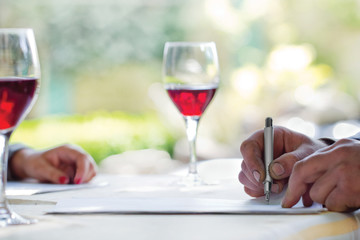 farmer signing a paper