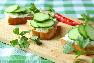 canape with cheese and fresh cucumber