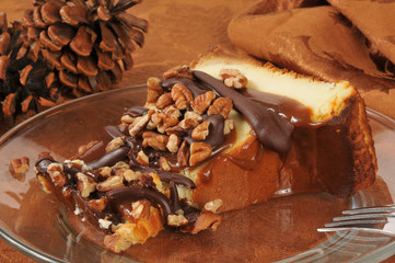 Cheesecake topped with chocolate and nuts