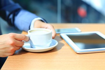 Businessman using digital tablet computer with modern mobile