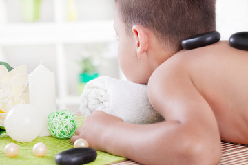 young boy in spa salon