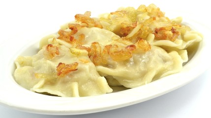 dumplings with meat, cabbage and onion