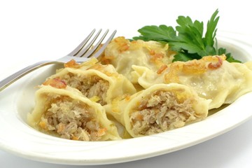 dumplings with meat, cabbage and onion