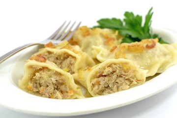 dumplings with meat, cabbage and onion