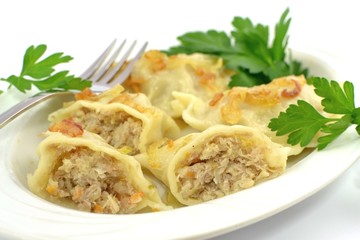 dumplings with meat, cabbage and onion