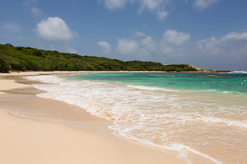 Fototapeta na wymiar Beautiful Golden Sandy Beach at Half Moon Bay Antigua