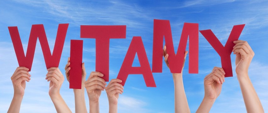 Many People Holding Red Witamy